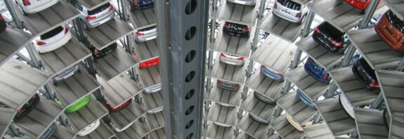 vehicles parked inside elevated parking lot