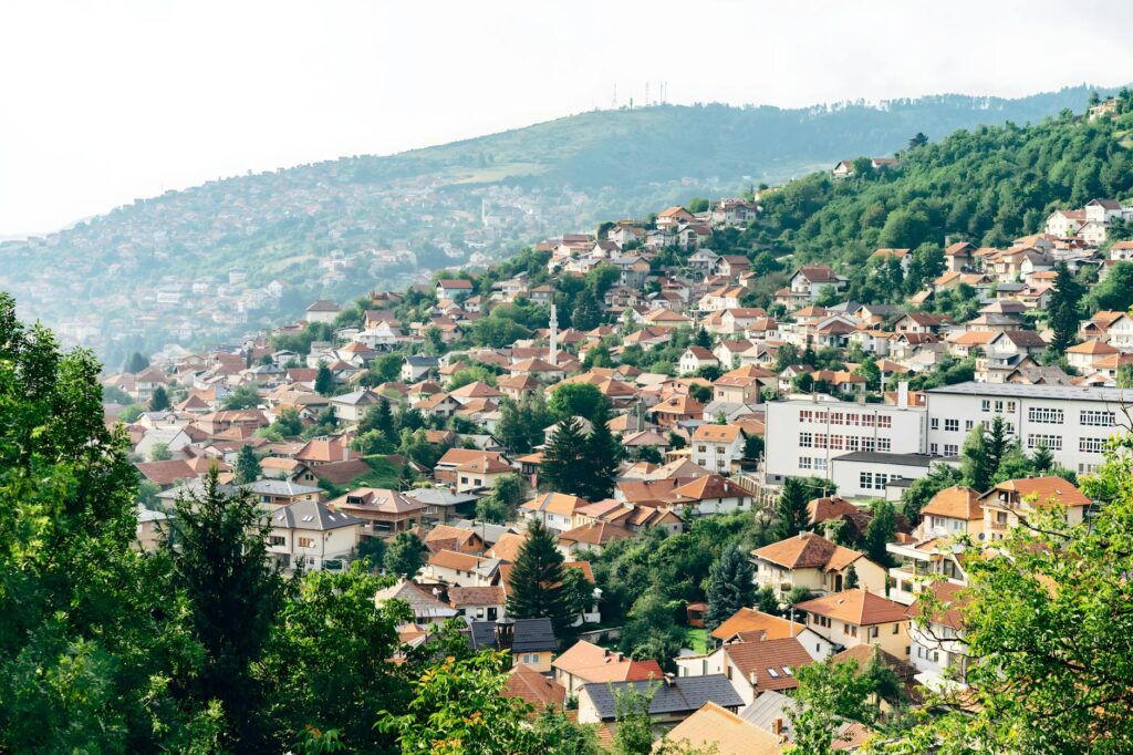 a view of a city from a hillside
