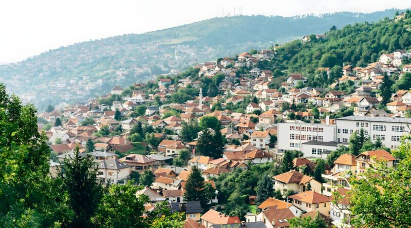 a view of a city from a hillside