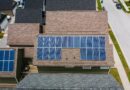 solar panels on tiled roofs of a house