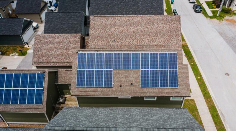solar panels on tiled roofs of a house