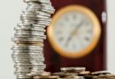 selective focus photo of stacked coins