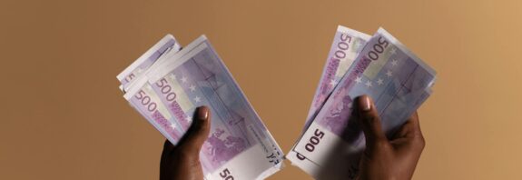 person holding banknotes