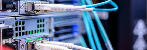 close up photo of cables plugged into the server