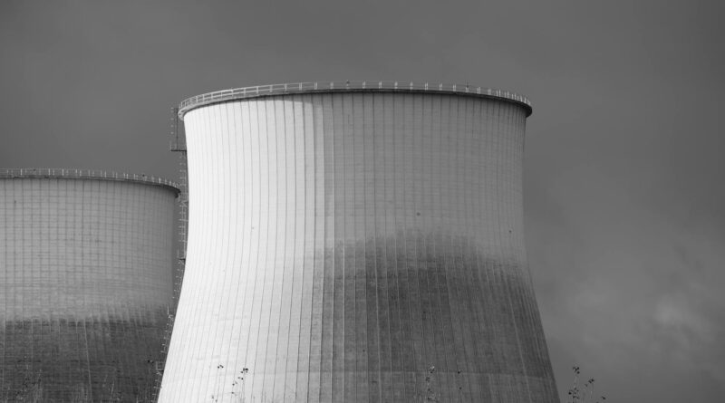 black and white photo of nuclear cooling towers