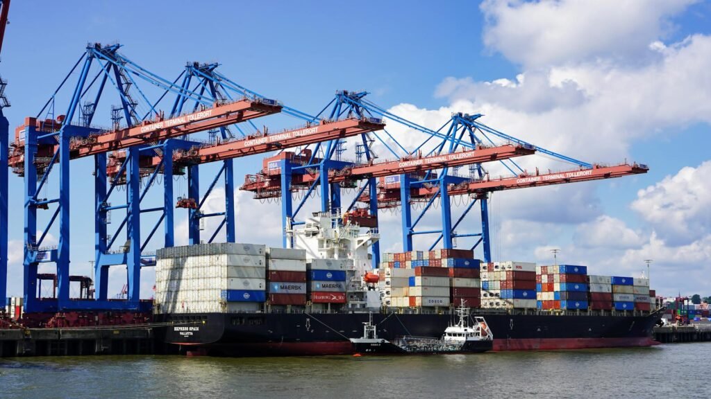 container ship docked at hamburg terminal