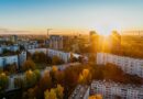 aerial view of white concrete buildings during golden hours