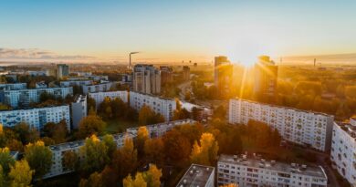 aerial view of white concrete buildings during golden hours