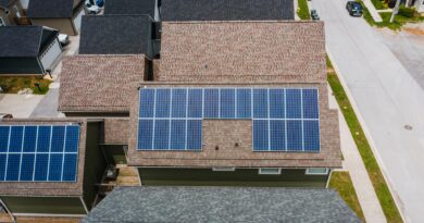 solar panels on tiled roofs of a house