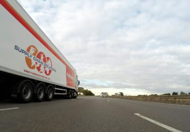 white trailer truck on concrete road