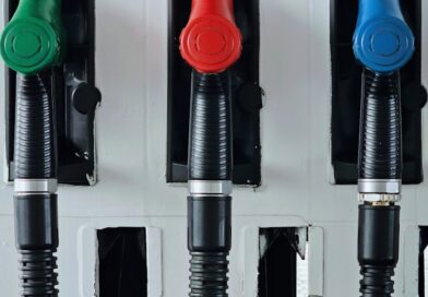 colorful fuel pumps at a gas station