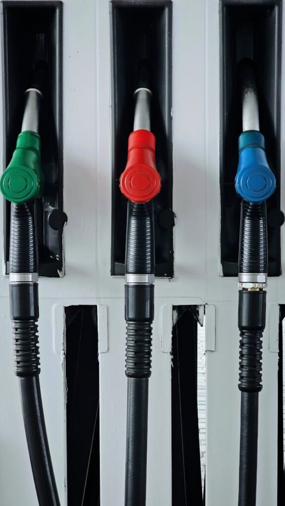 colorful fuel pumps at a gas station