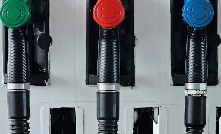 colorful fuel pumps at a gas station