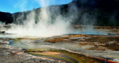 body of water and smoke