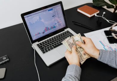 a person holding bank notes