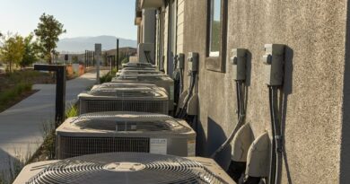 air conditioners attached to the back of a building