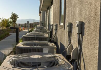 air conditioners attached to the back of a building