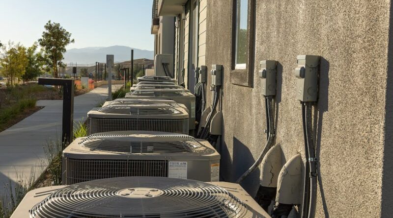 air conditioners attached to the back of a building