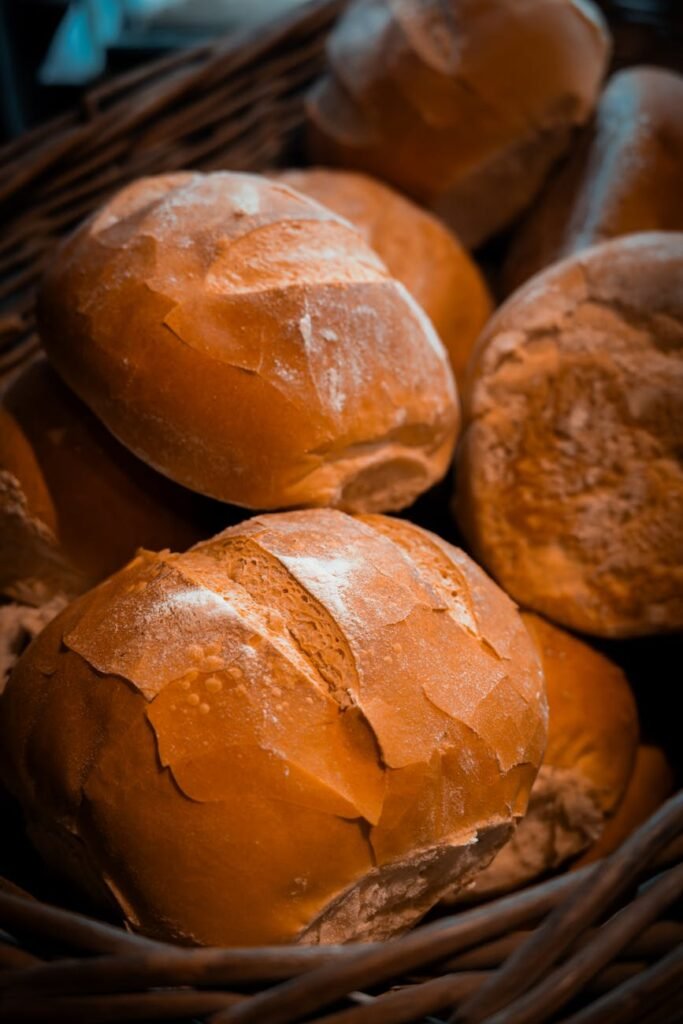 close up of fresh crusty bread in basket