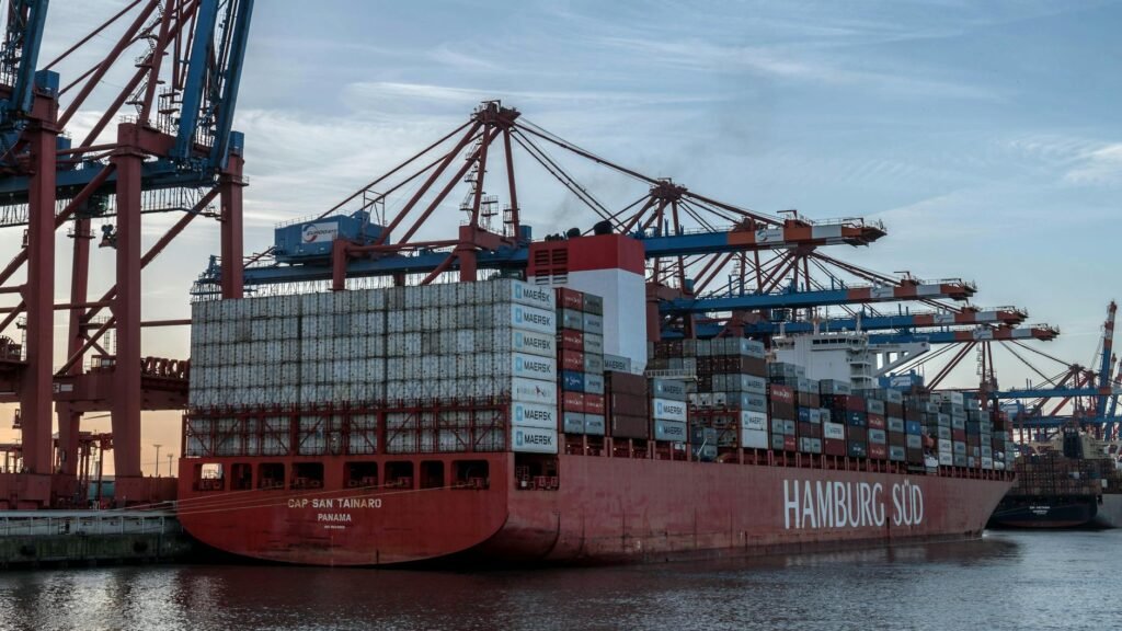 ship with containers in harbor