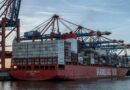 ship with containers in harbor